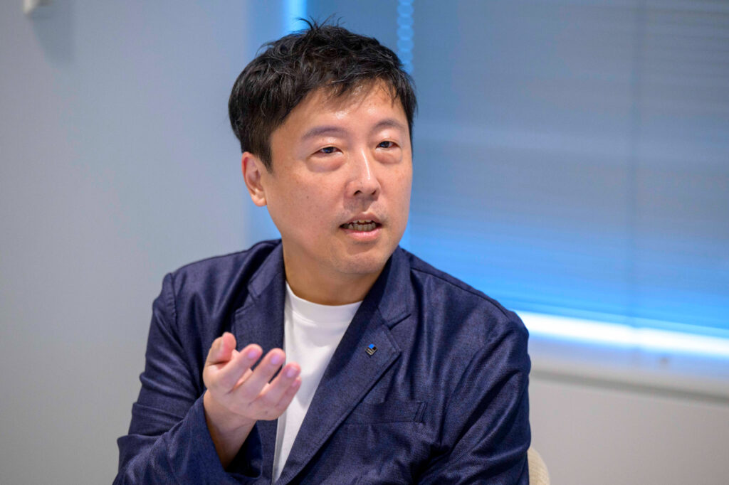 写真:インタビューに応じるTOPPANエッジの田村さん