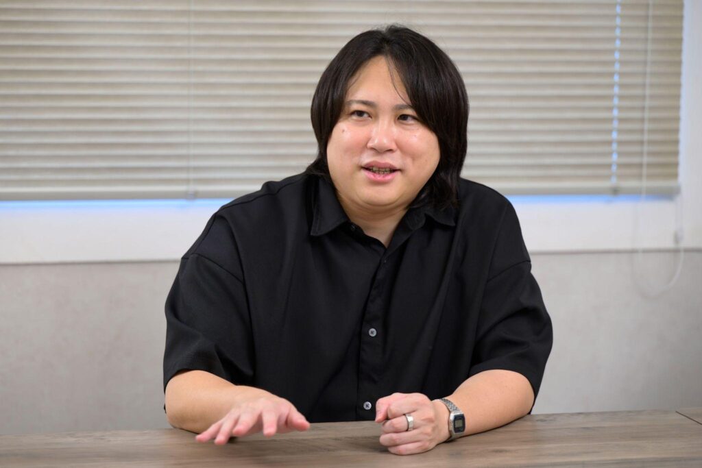 笑顔で語る宮本敦士さん